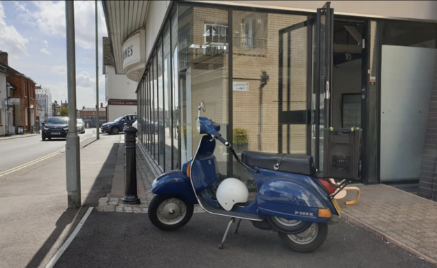 Paul's lovely old Vespa outside the gallery